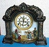 Ansonia Clock Co., C.1905, Royal Bonn, "LA ORB" porcelain china cased clock, with 8-day, gong strike mov't with open escapement on porcelain dial, in a very dark green case [almost black], and with a painted scene below the dial showing a Dutch family at the harbor's edge bidding farewell to a sailor or fisherman.