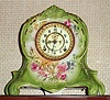 Ansonia Clock Co., Royal Bonn, "LA RIVIERE", light apple green porcelain clock in the French style, with open escapement on the dial, 8-day, gong striking.