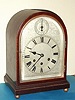 German, Gustav Becker {Freiburg / Schloss}, C.1914, WESTMINSTER chime mantel clock, with robust Becker signed movement, serial 2,387,097, in a round gothic style mahogany case.