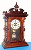 Welch, Spring and Co., Forestville, Conn, "CARY" rosewood mantel clock from the Patti series, 8-day, time, strike and alarm.