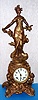 Ansonia Clock Co. New York, C.1904, "FLEUR DE LYS and 1175", Art Nouveau figure and base, 8-day strike with rococo sash and porcelain dial.