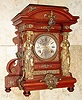 Ansonia Clock Co., New York, C.1894 "SENATOR", antique mahogany cased mantle clock with brass trimmings. Features full figured female columns on either side of the dial with other large and impressive brass bits. 8-day, time and gong striking.
