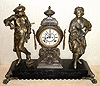 Ansonia Clock Co., New York, C.1880, "MELODY and MOTION" double statue figural clock [rare model], with open escapement on porcelain dial, gong striking, 8-day