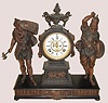 Ansonia Clock Co., New York, C.1894, "COMBATANTS" double statue figural clock [rare model], with open escapement on porcelain dial, gong striking, 8-day.