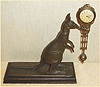 German, Junghans, C.1910, KANGAROO novelty swing clock, 8-day, time. The movement is contained in the top of the "clock arm" and the entire assembly swings from side to side on the nose of the Kangaroo.
