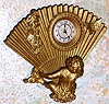 Ansonia Clock Co., New York, C.1900, "BABY" cast metal desk "fan" being held by an infant, with a 1-day timepiece movement.