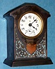 Ansonia Clock Co., New York, C.1900, "NOVELTY No. 279" cast metal desk novelty, with 1-day rear wind mov't, with porcelain dial