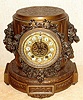 Ansonia Clock Co., New York, C.1904, "FLORIDA" base only, complete with movement, dial and gong. This base will accept Music, Cherubs, Gaiety, Art, Commerce, or any large Ansonia statue with round base. Has fancy dial with individual cartouche numerals; scape wheel support is 2 miniature brass cherubs.