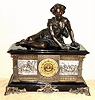 Ansonia Clock Co., New York, C.1904, "COLUMBIA", figural clock, with 'Shepherd Boy' figure, 8-day gong strike with open escapement on fancy brass dial.