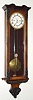 Austrian, Adolf Koll, Wien, Biedermeier era "Vienna Regulator", full quarter striking grand sonnerie, weight driven, with springs for the striking trains, 2-day. The case with rosewood veneer on outer surfaces, front of back is grained, slide mount movement on seatboard.