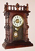 Welch, Spring and Co., "Gerster V.P.", Circa 1880, 8-day time/strike/alarm rosewood case mantel clock, in this model the alarm spring is inside and wound from the center of the bell.