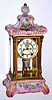 Ansonia Clock Co., Royal Bonn, CRYSTAL REGULATOR No. 3, in pink with yellow and lt blue accents and gold highlights + multi colored pansies, open 'scape on porcelain dial.