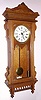 Waterbury Clock Co., "REGULATOR No. 57", C.1906, quartered oak cased. 2-weight time only wall clock, 8-day with seconds hand below 12.
