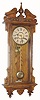 Waterbury Clock Co., C.1905, "ELTON" model, oak cased wall clock, 8-day, time and gong strike, spring, and with fancy pierced hands.