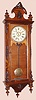 Wm. L. Gilbert Clock Co., . 1875, "REGULATOR No. 3", in rosewood, 8-day, weight driven timepiece, in a fancy Victorian case designed after popular Austrian wall clocks of the time.