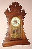 E. Ingraham Co., Bristol Conn. "PANSY" model mantel clock 8 day time, strike and alarm spring driven mvt in walnut case, c1890