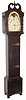 American tall clock, unsigned, 8-day with rolling moon, the last repair label from 1883, Philadelphia. Mov't with well shaped plates along the top and cut out at bottom to conserve brass. The informal country case of mixed woods retains large cast door hinges and a deep broken arch. C.1825.