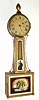 Unknown, Massachusetts, C.1820, 8-day banjo or patent timepiece, weight driven, the case with rope molded, gilt frames.