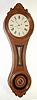 E. Howard and Co., Boston, "REGULATOR No. 7", figure 8 wall clock, C.1880, in a black walnut case, 8-day, time, weight driven.