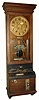International Time Recording Co., Endicott, N.Y., heavy duplex time only mvt with original day and time, punch card recorder in walnut case with Arabic numeral metal dial and two wind indicators, c1920