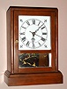Quartz cottage clock with handcrafted, made in 1970. Ht 11 1/2"