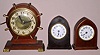 (3) desk clocks; two Seth Thomas "COMO" models 8 day time only mvt Ht 5 1/2" and a United electric in ship's wheel style Ht 8"