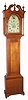 New Hampshire, 8-Day Painted Dial tall clock (unsigned dial), C.1820, in a birch case with maple coloring, and with a scroll or broken arch top.