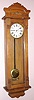 New Haven Clock Co., New Haven, Conn. "COLUMBIA" model wall clock 30 day timepiece, using rugged double wind New Haven mov't, with Roman numeral 8" gilt pan dial, c1911