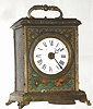 German, 30 hour portable desk clock, c.1890, with painted aviary decorations, in the French style, pendulette mov't with attached pendulum.