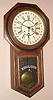 Ansonia Clock Co., Regulator A with calendar, time and gong strike, in a walnut case, as-found.