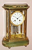 French, Japy Freres Paris crystal regulator retailed by John Wanamaker Philadelphia - New York 8 day time and strike spring driven mvt stamped 'MADE IN FRANCE' and also stamped with Japy Freres and John Wanamaker marks in brass case on onyx base with bun feet and onyx top with beaded accent. The Arabic numeral porcelain dial with gilded engine turned bezel, has retailers name. Two vial (mercury) pendulum is orig and intact, c1900