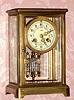 French, Vincenti and Cie, 8-day time and gong strike, 4-glass crystal regular, in a smaller than usual size, and with porcelain dial having polychrome floral decorations, and the inscription "Long" and Boston, c.1900.