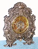 German, reproduction Teller-Uhr, mantle style, in a heavy cast brass case, cast brass dial and cast hands, cow's tail pendulum, c.1975. This is a quality clock; they sold new for a thousand D-marks, around $300 at the time.