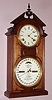 Ithaca Calendar Clock Co., SHELF LIBRARY, walnut cased, 8-day time and gong strike, double dial perpetual calendar with H. B. Horton lower mechanism.
