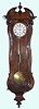 Austrian, "Vienna Regulator" one-wt timepiece, in a serpentine wall case, C.1860.
