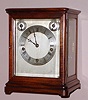 German, Winterhalder and Hoffmeier, unusual 4-glass and mahogany case, just slightly larger than the robust movement, quarter chiming Westminster tune on 4 very heavy flat wire gongs, and striking the hours on a still larger gong, c.1900.