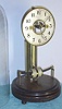 French, Model 100 "Bulle Dome", battery power, C.1925, designed by Maurice Phillipe Favre-Bulle in 1920, with original glass dome, and with retailers brass label: Cie. des Appareils Horo-Electrique, Boulogne s/ Seine