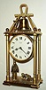 Swiss, Imhof, small Desk automaton, time and strike; two monks below, the left monk pulls a wire to ring the bell at top, once on the half hours and full count on the hours. Back wind and set lever movement, C.1970