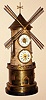 French, attributed to Guilmet retailed by Alibert, 222 Rue Rivoli, Paris, "WINDMILL", clock from the Industrial series, a time only spring driven movement in the tower with the mill blades turned by a cord traveling up the tower from a separate movement in the base and wound by opening the door of the mill in the base with a silvered Roman numeral chapter ring with an Aneroid barometer above the clock and two mercury thermometers, one Centigrade and one Fahrenheit, c1890