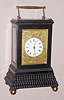 French, Henry Marc, brass cased carriage clock half hour strike signed on dial and spring driven mvt with helical hairspring and counterpoised platform escapement in ebonized ripple molded case with Roman porcelain dial surrounded by engraved gilt mask, c1885