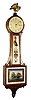 Chelsea Clock Co. 8 day spring driven banjo or patent timepiece retailed by Shreve, Crump and Low, Boston in mahogany case with lower tablet picturing a scene of the War of 1812 battle between the Constitution and the British Guerriere and gilded brass eagle finial, c1948 sNo. 552248