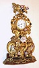 French, small repousse with porcelain flowers, fantasy timepiece, mov't signed Jeanperin, a'Paris with Roman numeral porcelain dial, sNo. 7701 c1850