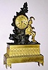 French gilded brass figural waterfall automaton mantel clock with 8 day time and bell strike silk thread suspension spring driven movement with troubadour seated atop bronze rocky outcropping with crystal "waterfall / fountain" turning as clock ticks giving it the appearance of pouring down the rock surface, on gilded brass base with fancy feet and engine turned gilt Roman numeral 3 1/2" dial and Breguet style moon hands, c1840, mvt marked with "B.P. and F." and "3410"