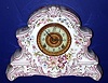 Ansonia Clock Co., "Dresden" model, Circa 1905, 8-day time/strike porcelain mantel clock. Information on the back states this clock was manufactured for the American Wringer Co., No. 99 Chambers St., New York. This was Ansonia's domestic version of their imported "LaNord" case, with only minor variations.