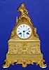 French, Circa 1850, 8-day time and bell strike figural mantel clock, gilt bronze, movement marked "Farret".