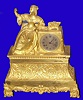 French, ormolu figural clock, A Lady at her Dressing Table, with an open box of jewels, 8-day time and bell strike, with silk thread movement, C.1840. This clock is larger than average.