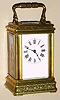 French, brass cased carriage clock, miniature time only, spring driven movement with platform lever escapement in floral engraved Cannelee style case with painted porcelain panels on sides and rear door and Roman numeral porcelain dial, c1900