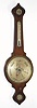 English, Banjo barometer in rosewood, mercury tube design [no mercury], less crystal and reference pointer, retailed by Waight, Brompton, and with hygrometer at top, thermometer in throat, c.1860