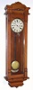 New Haven Clock Co., C.1890, "COLUMBIA" model wall timepiece, 30 day duration, in a golden oak case, with restoration.