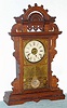 Seth Thomas Clock Co., c.1885, ECLIPSE model walnut parlor clock, time, gong strike and alarm, 8-day, button latch door.